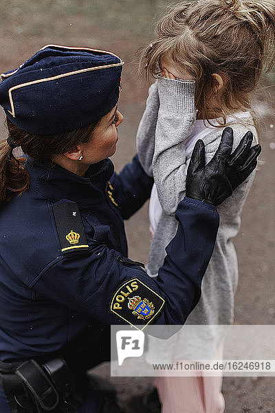 Police woman with daughter