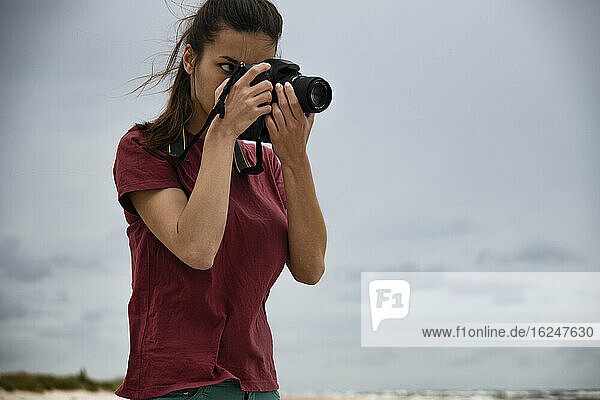 Female photographer with camera