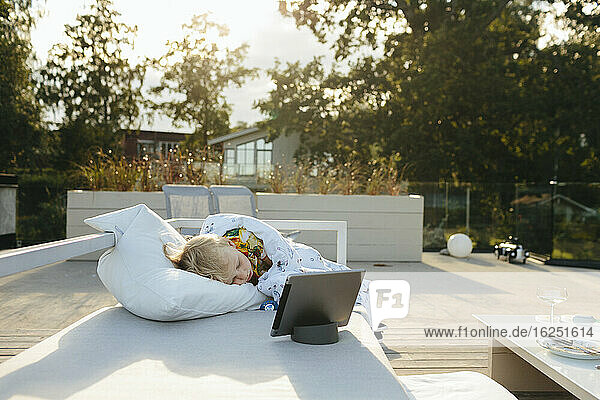 Girl sleeping on terrace