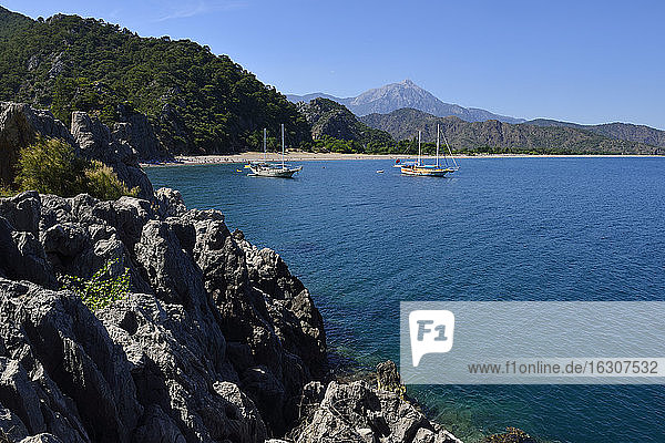 Turkey  Antalya Province  Lycia  Olympos Beydaglari National Park  View of tourist boats near beach of Cirali