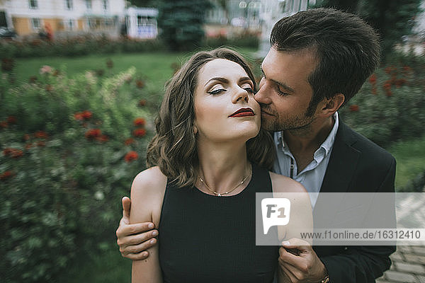 Ukraine  Couple embracing in garden