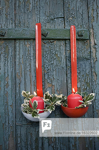 Christmas decoration made of soup ladles and candles