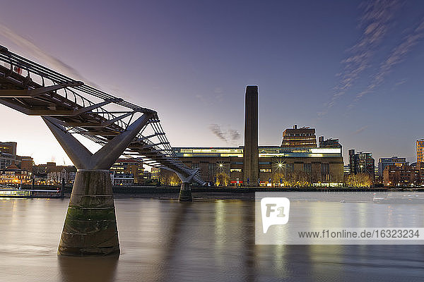 UK  London  Tate Gallery of Modern Art and Millennium Bridge at twilight