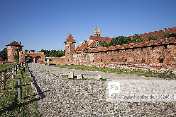 Poland Malbork Castle road and alley along the walls