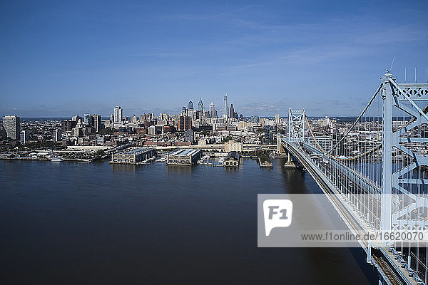 USA  Pennsylvania  Philadelphia  Aerial view of Delaware River and Ben Franklin Bridge with city downtown in background