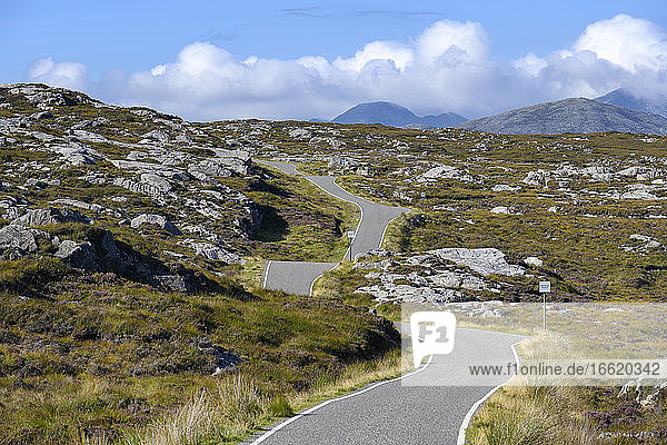 UK  Scotland  Golden Road stretching along southeast coast of Isle of Harris