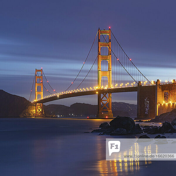 Golden Gate Bridge over sea at night in San Francisco  California  USA