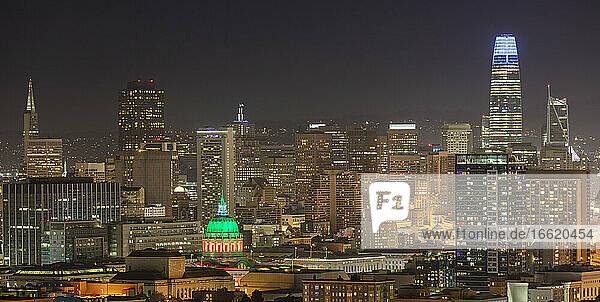 Urban skyline with city hall at night in San Francisco  California  USA