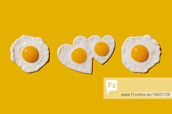 Studio shot of heart shaped fried eggs