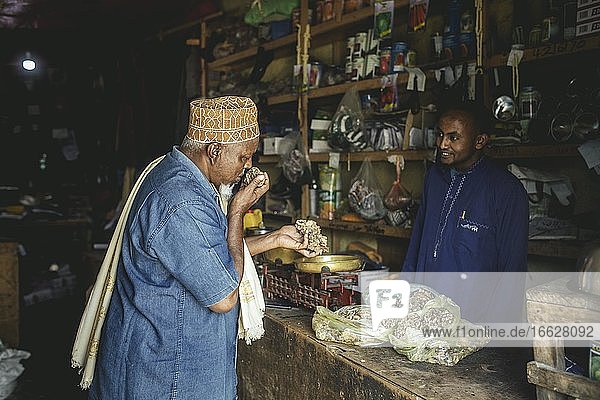 Sultan Abdullah  village elder from Madar Moge in a shop selling incense from his area  Erigavo  Sanaag  Somaliland