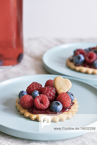Open tart with jam and berries.
