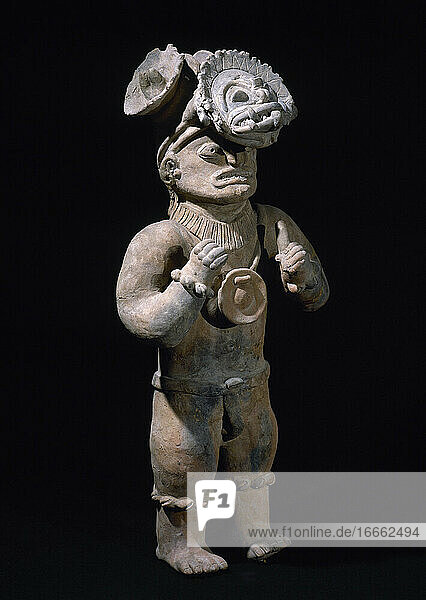 Pre-Columbian art. Pre-Incan. Jama-Coaque Culture. 500 BC-1531 AD. From Ecuador. 68 x 33 cm (diameter). Male figurine. Stye chone. Private collection.