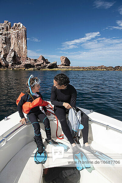 A mom and her son getting ready to snorkel at Espíritu Santo Island.