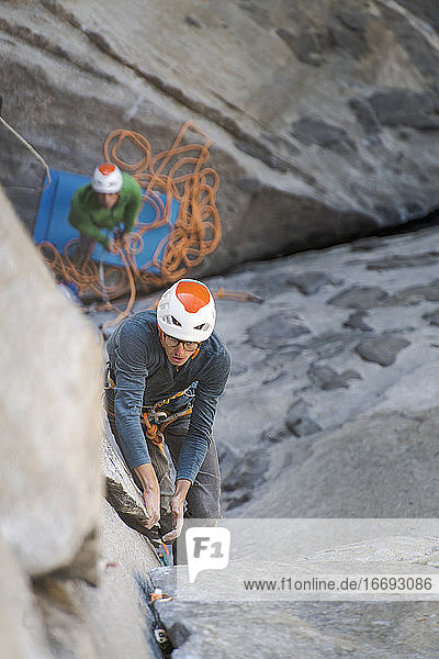 Rock climber crack climbing on the Nose  El Capitan in Yosemite