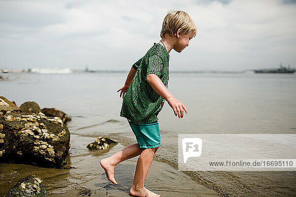 Six Year Old Boy Playing on Beach in Coronado