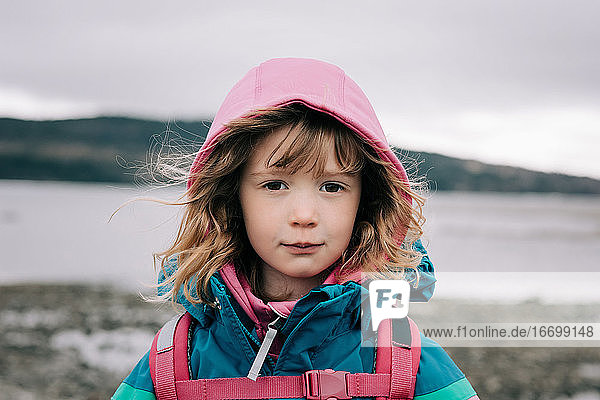 close up portrait of young girl hiking in Sweden