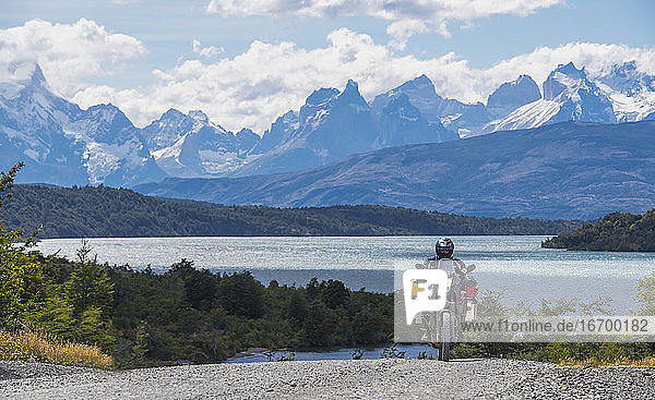 Man riding his touring motorbike at Torres del Paine  Patagonia