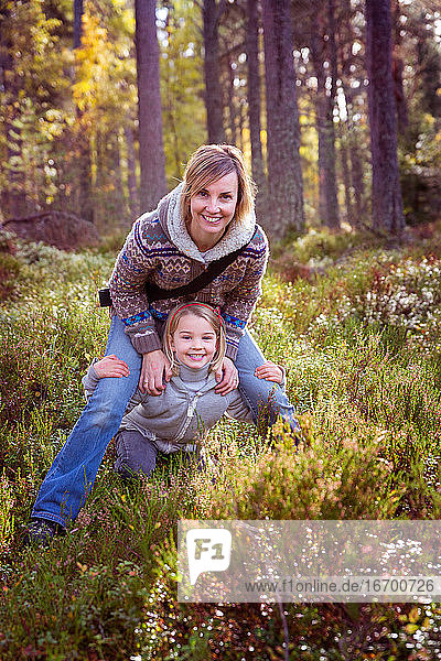 Mother and Daughter Portrait in the Woods