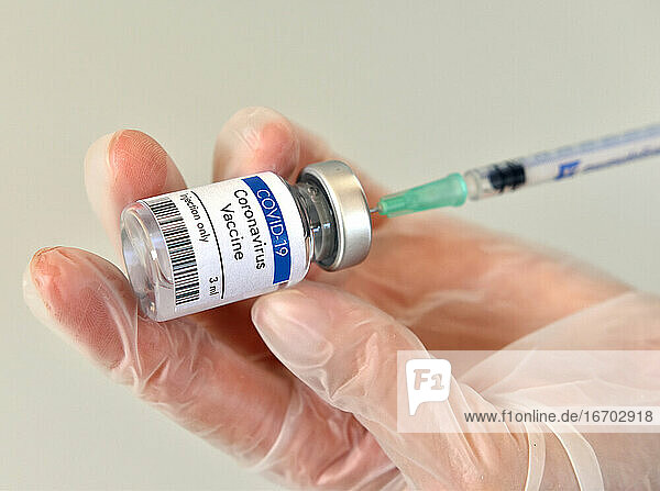 Coronavirus vaccine vial bottle in research laboratory..Close-up view