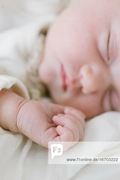 Closeup of a sleeping newborn's hand