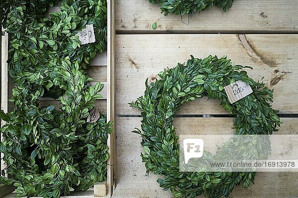 Stockholm  Sweden Christmas wreaths for sale at a farm stand.