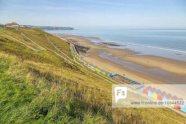 View of colourful beach huts on West Cliff Beach  Whitby  North Yorkshire  England  United Kingdom  Europe
