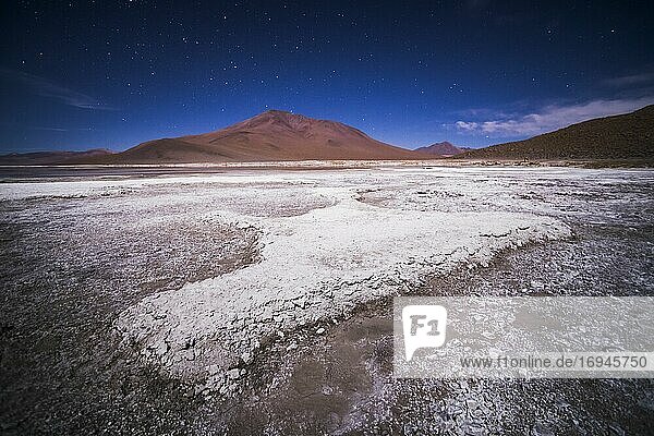 Stars over Chalviri Salt Flats at night (aka Salar de Chalviri)  Altiplano of Bolivia in Eduardo Avaroa National Reserve of Andean Fauna