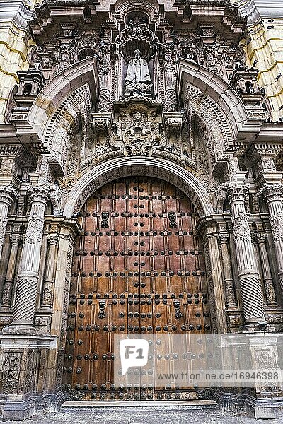 Large wooden church doors in historic centre of Lima  Lima Province  Peru