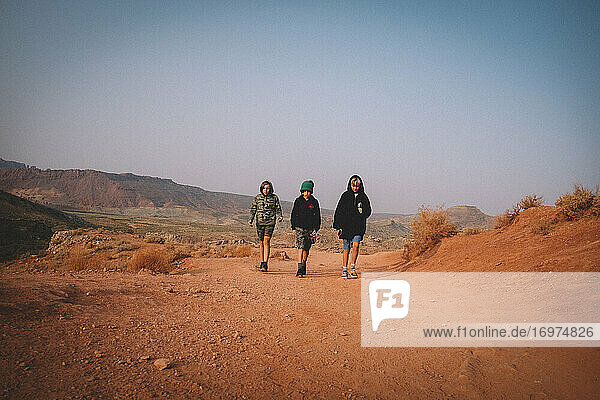 Three Tween Boys on a Hike in the Desert.