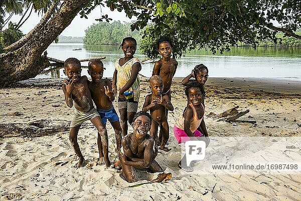 Children playing in the sand  east of Buchanan  Liberia  Africa