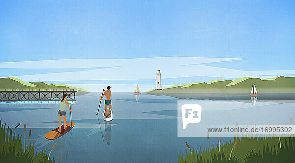 Paar Stand Up Paddleboarding auf idyllischen Sommer See
