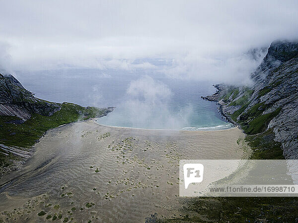 Beautiful coastline by mountain at Helvetestinden  Lofoten  Norway