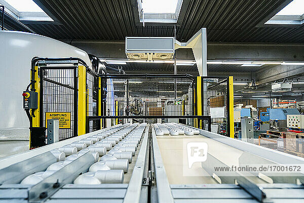 Conveyor belt arranged on production line in manufacturing factory