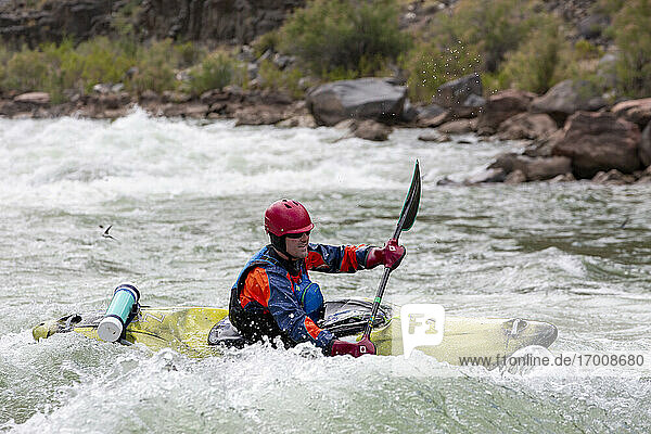 Shooting rapids in a kayak on the Colorado River  Grand Canyon National Park  UNESCO World Heritage Site  Arizona  United States of America  North America