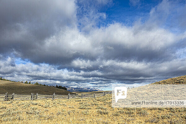 USA  Idaho  Stanley  Ranch landscape with clouds and mountains in distance