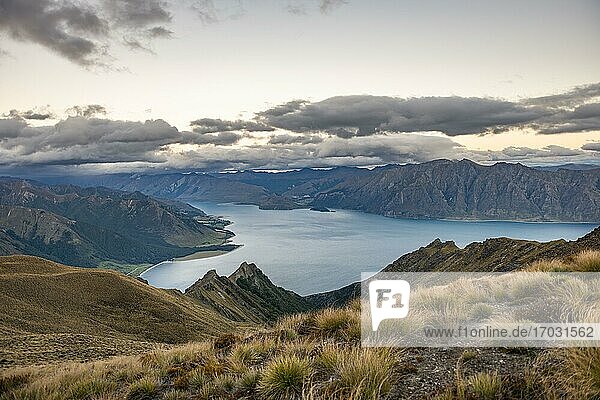 View of Lake Hawea with cloudy sky  lake and mountain landscape  view from Isthmus Peak  Wanaka  Otago  South Island  New Zealand  Oceania