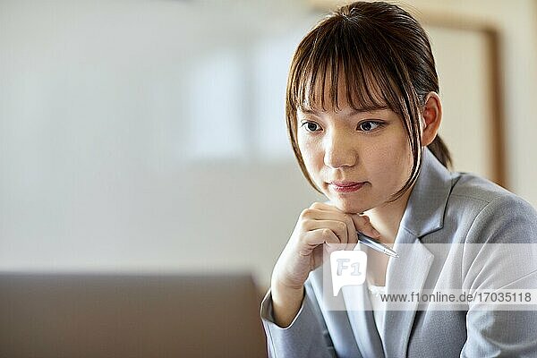 Young Japanese woman working