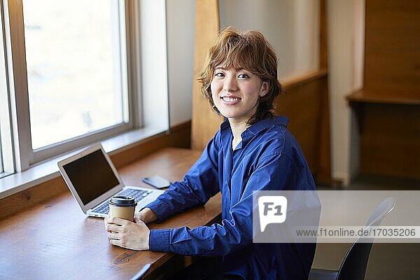 Young Japanese woman working