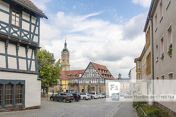 Museum of Luther with half timbered house by St George Church against cloudy sky in Eisenach  Germany