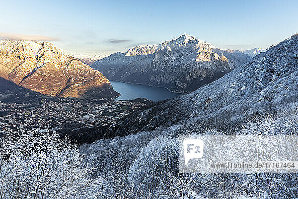 Italy  Lecco  Lake Como  View of mountains and lake in valley on winter day