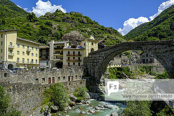 Italy  Pont-Saint-Martin  Town in Aosta Valley with Roman arch bridge stretching over river Lys in foreground