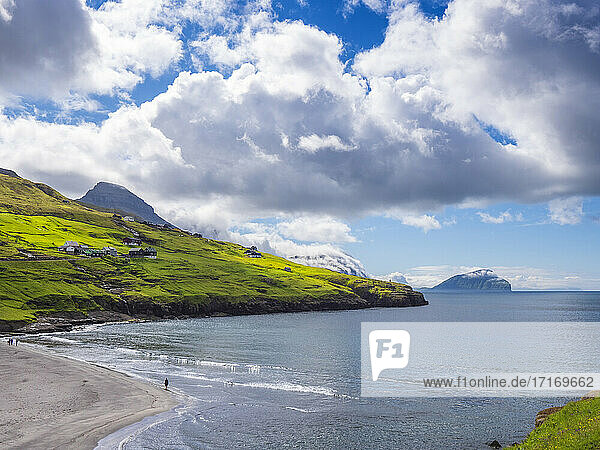 Scenic view of Leynasandur beach against cloudy sky  Iceland
