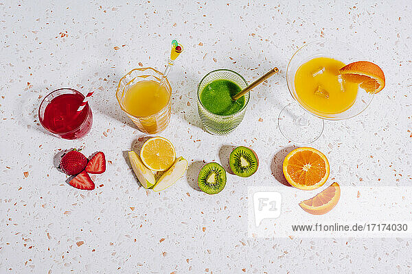Healthy summer fruit juices on terrazzo marble home