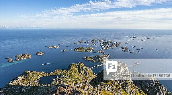 Lake Heiavatnet  houses on small rocky islands in the sea  view from the top of the mountain Festvågtind to Henningsvær  Vågan  Lofoten  Nordland  Norway  Europe