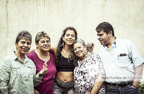 Generations of happy Mexican family in summer