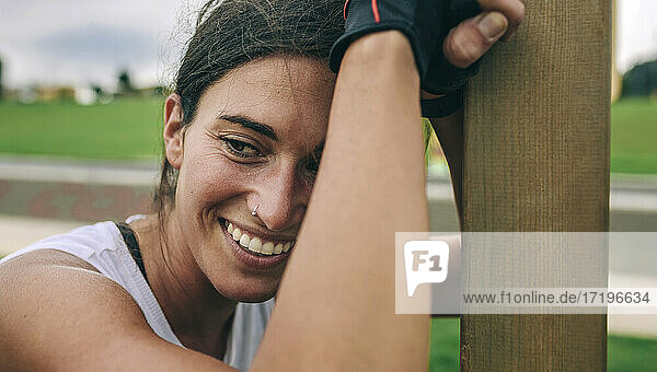 Athlete woman smiling after training