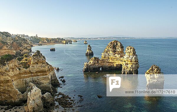 Rugged rocky coast with cliffs of sandstone  rock formations in the sea  Ponta da Piedade  Algarve  Lagos  Portugal  Europe