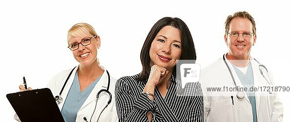 Hispanic woman with male doctor and nurse isolated on a white background