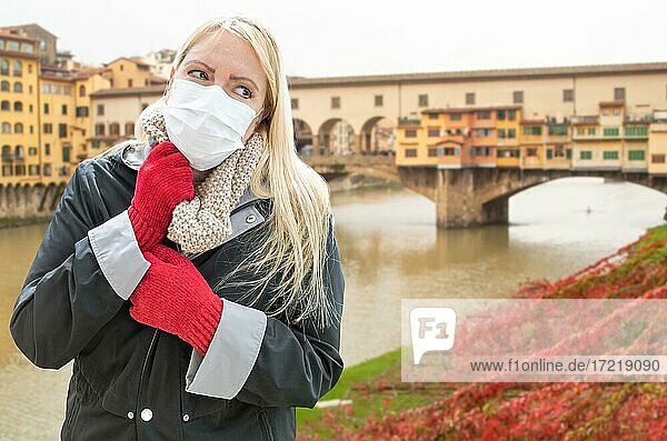 Young Woman Wearing Face Mask Walks the Streets In Florence  Tuscany  Italy  Europe