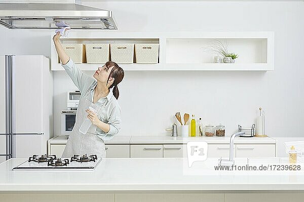 Japanese woman cleaning the house